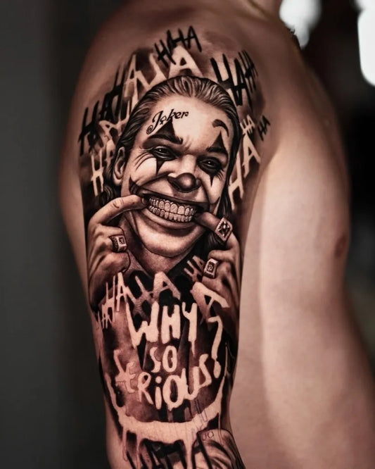 Big Black and Grey Joker with Laughing Face and Text on Men Arm Tattoo by @franciscoreinart
