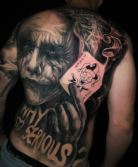 Big Black and Grey Joker with Playing Card and Why So Serious on Men Back Tattoo by @erikgitattooer_