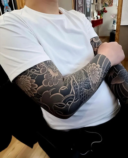 Big Black and Grey Koi and Peonies Tattoo on Men Arm by @japanese.ink