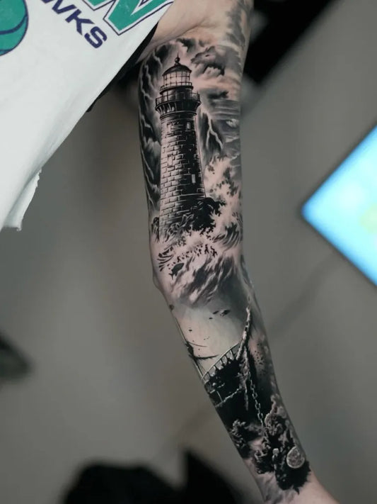 Big Black and Grey Lighthouse Storm Tattoo on Men Arm by @luismy_ink