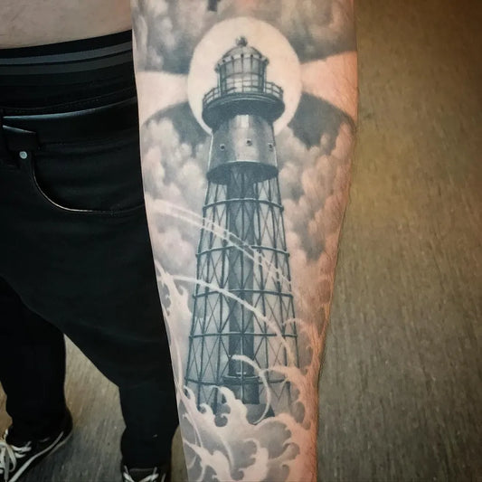 Big Black and Grey Lighthouse and Clouds Nautical Tattoo on Men Arm by @petterpusher