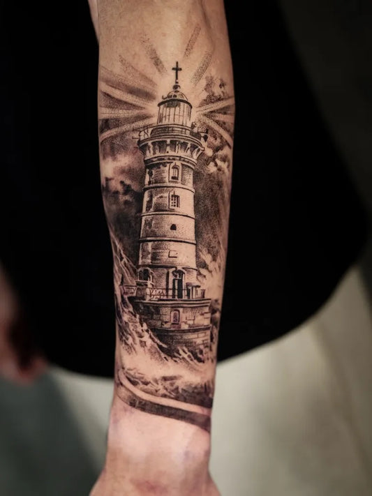 Big Black and Grey Lighthouse with Rays Tattoo on Men Arm by @descriptive_art_collective