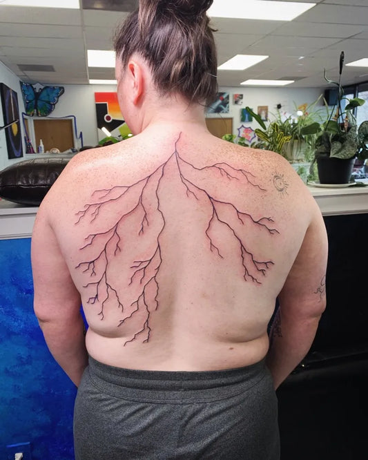 Big Black and Grey Lightning Branches Tattoo on Women Back by @odyssey.tattoo