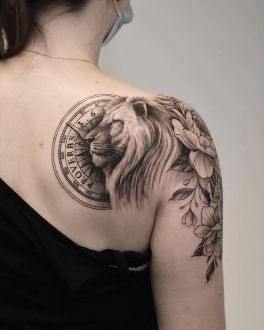 Big Black and Grey Lion Compass and Flowers on Women Shoulder Tattoo by @bensongascon