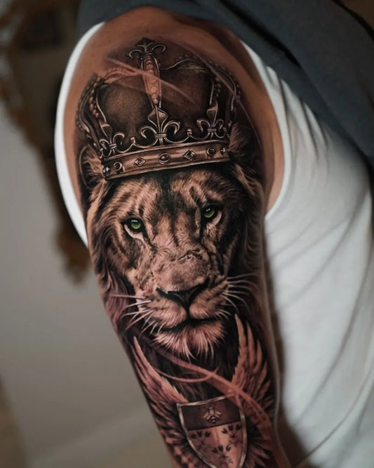 Big Black and Grey Lion Crown Shield on Men Arm Tattoo by @salahtattooart