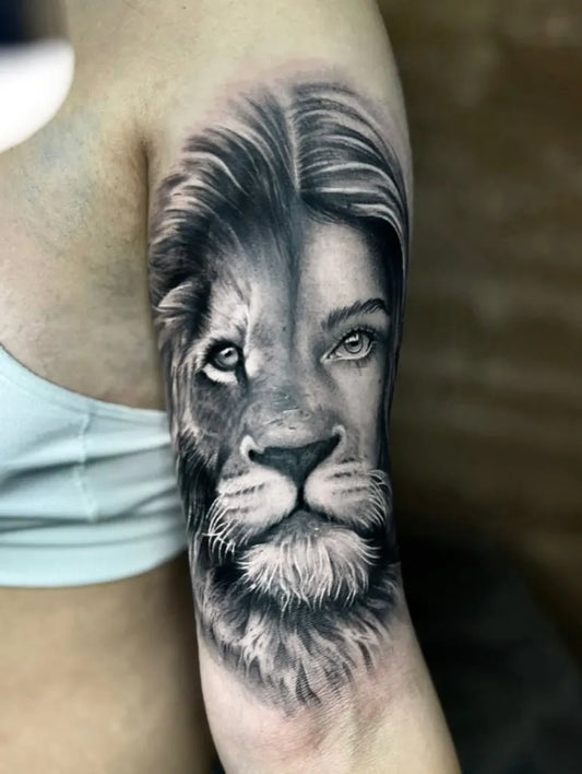 Big Black and Grey Lion Face on Women Arm Tattoo by @rotem_hadar