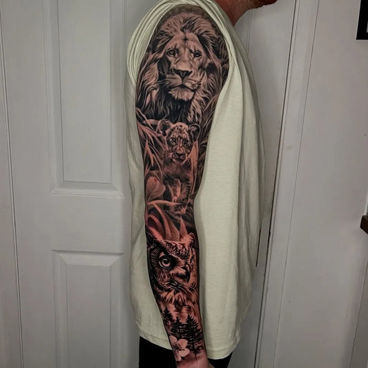 Big Black and Grey Lion Tiger Cub on Men Arm Tattoo by @tommyttattoo