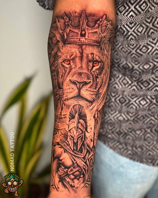 Big Black and Grey Lion Warrior on Men Arm Tattoo by @nomadtattooindia