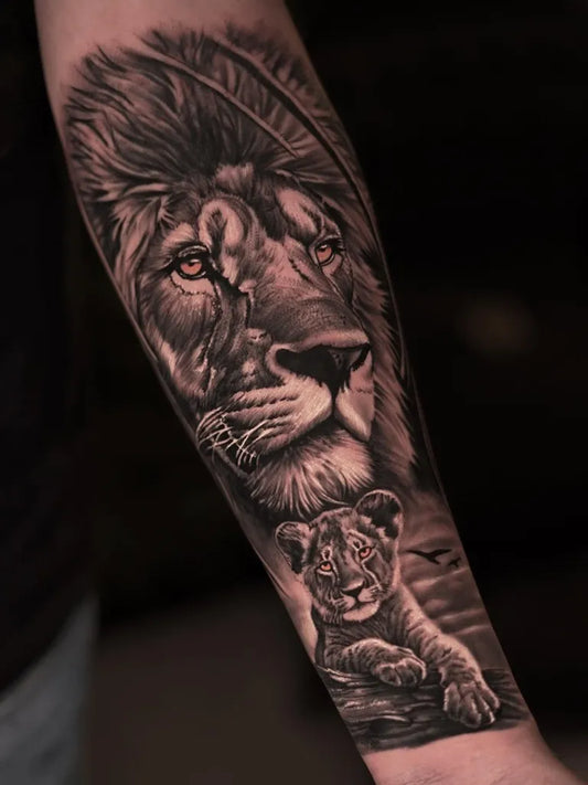 Big Black and Grey Lion and Cub Tattoo on Men Arm by @kauecamargo.tattoo