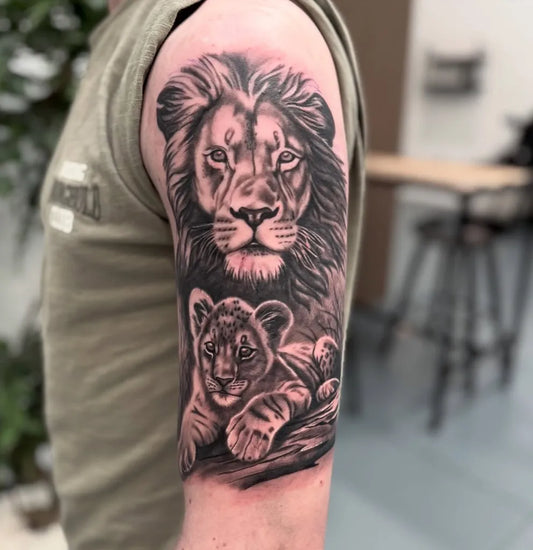 Big Black and Grey Lion and Cub on Men Arm Tattoo by @camerondunntattoo