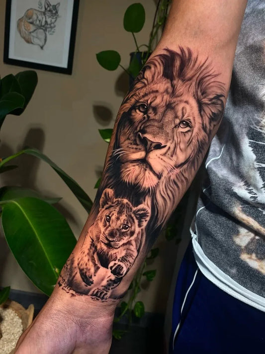 Big Black and Grey Lion and Cub on Men Arm Tattoo by @gon.tattoo
