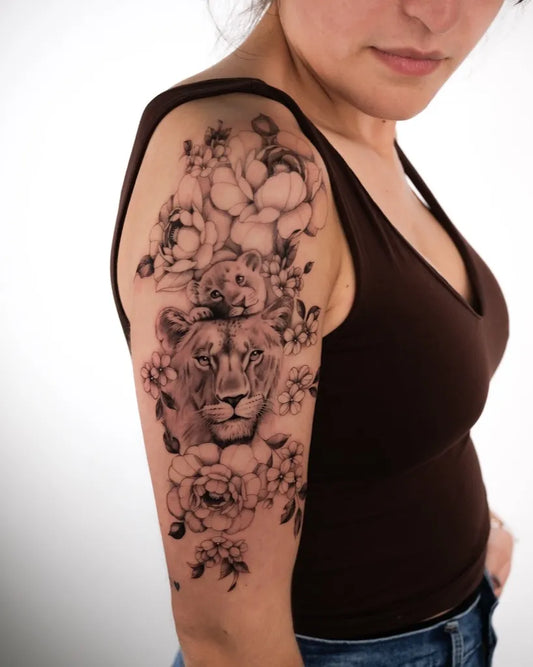 Big Black and Grey Lion and Roses on Women Arm Tattoo by @sophiastattoos