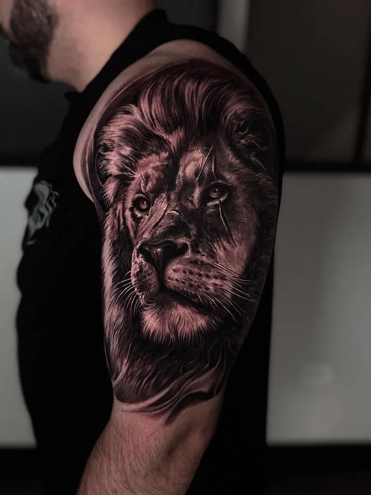 Big Black and Grey Lion on Men Arm Tattoo by @erisqesari