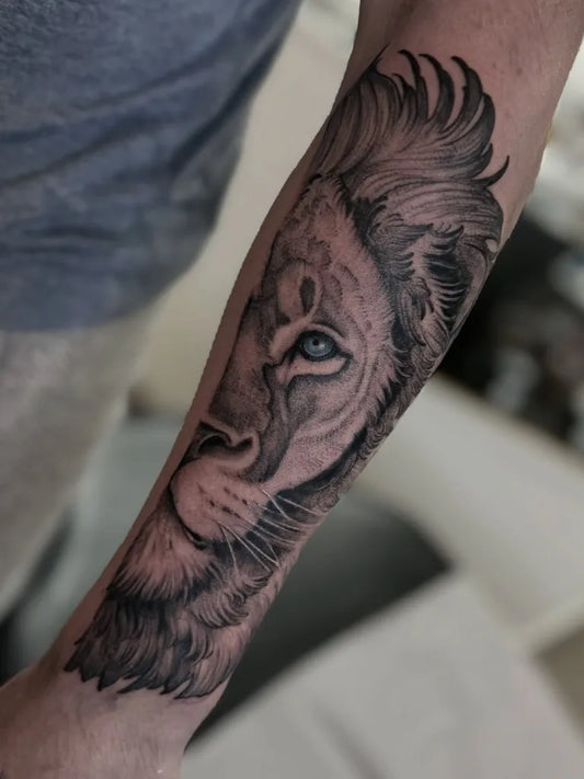 Big Black and Grey Lion on Men Arm Tattoo by @juliabelltattoo