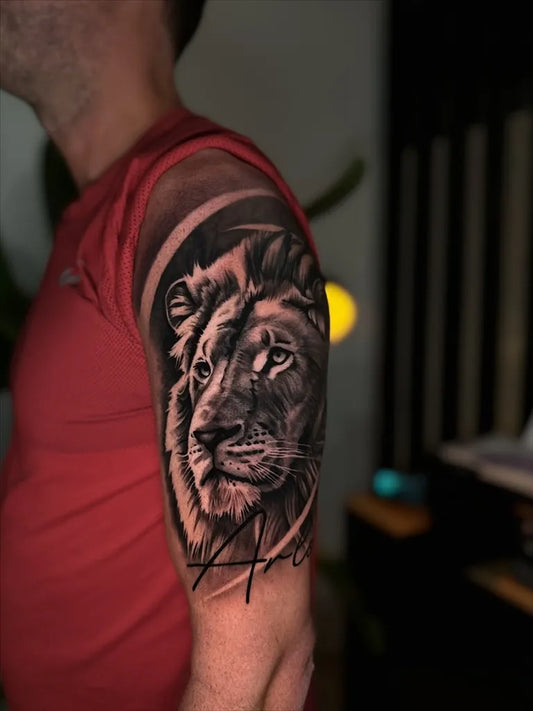 Big Black and Grey Lion on Men Arm Tattoo by @tiagosalgado.tattooer