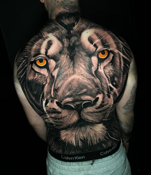 Big Black and Grey Lion on Men Back Tattoo by @astartattoos