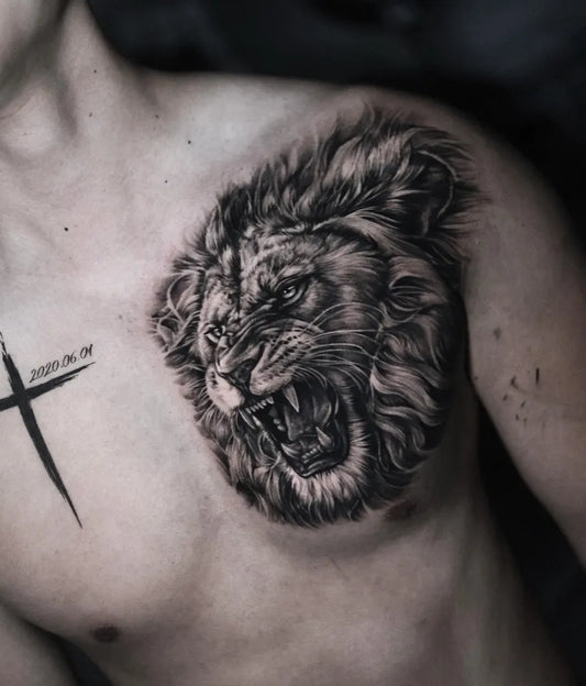 Big Black and Grey Lion with Cross on Men Chest Tattoo by @tattooer.lll