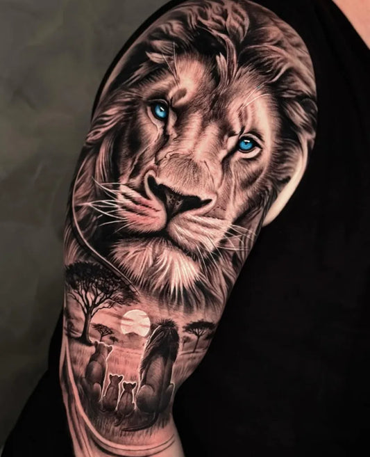 Big Black and Grey Lion with Savanna Sunset Tattoo on Men Arm by @iinfinite.art