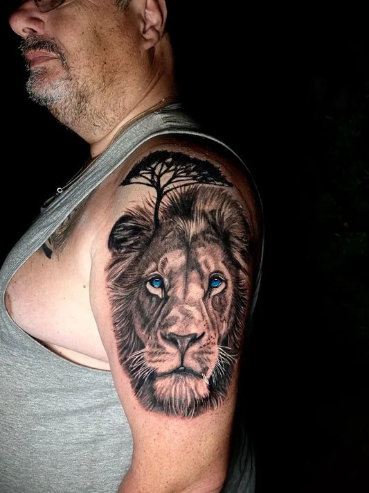 Big Black and Grey Lion with Tree on Men Shoulder Tattoo by @oguzhanonguntattoo