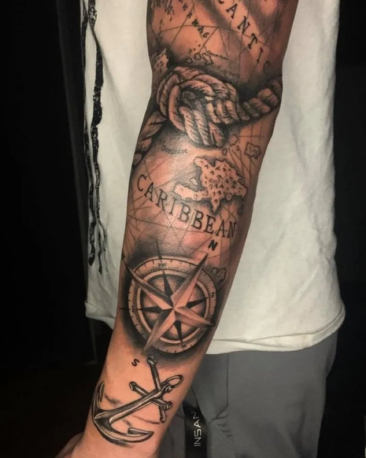 Big Black and Grey Map Compass Anchor Nautical Tattoo on Men Arm by @blackdiamondtattoostudiotn