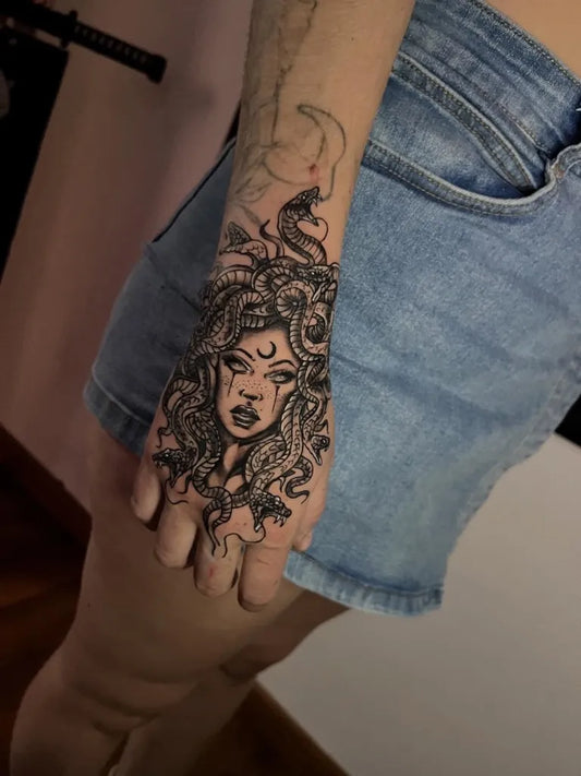 Big Black and Grey Medusa Tattoo on Women Arm by @crown.ink.tatto