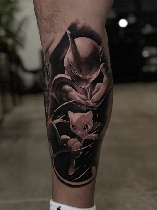 Big Black and Grey Mewtwo and Mew Tattoo on Men Leg by @alexmorotattoo