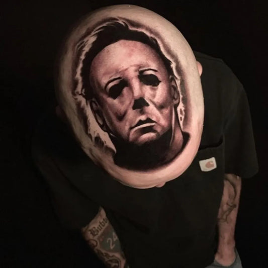 Big Black and Grey Michael Myers Horror Tattoo on Men Head by @the.tattooed.archivist