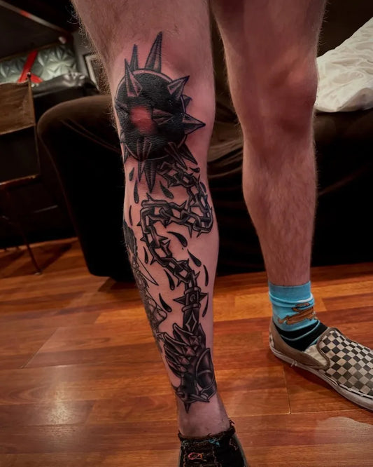 Big Black and Grey Morning Star Chain Tattoo on Men Knee by @munstersincorporated