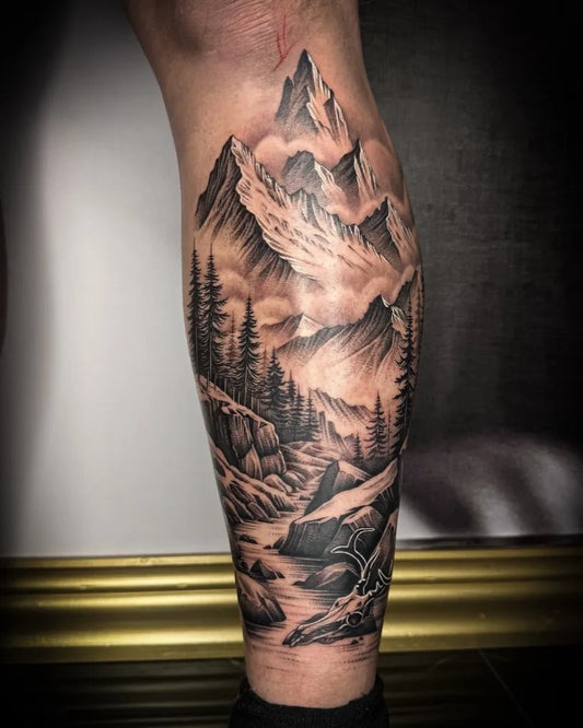 Big Black and Grey Mountain Forest River Tattoo on Men Leg by @soilejohannatattoo