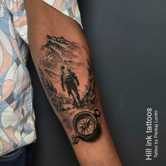 Big Black and Grey Mountain Hiker Compass on Men Arm Tattoo by @hill_ink_tattoos