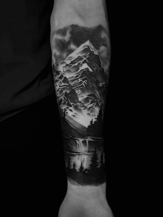 Big Black and Grey Mountain Landscape Tattoo on Men Arm by @fullmoontattoo