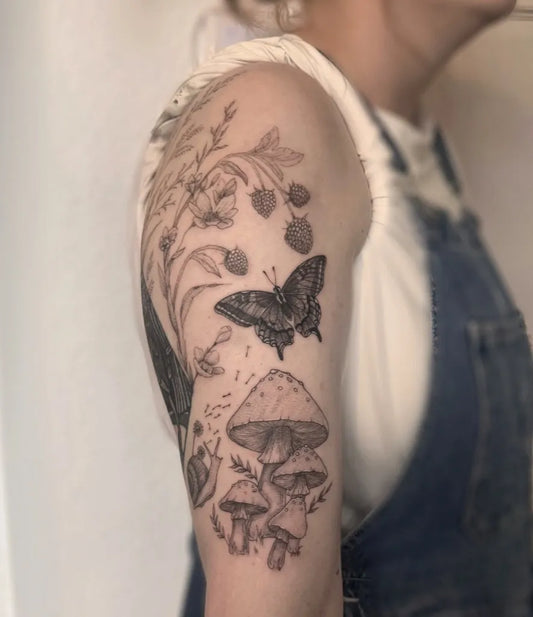 Big Black and Grey Mushroom Butterfly Flowers on Women Arm Tattoo by @bagginstattoo