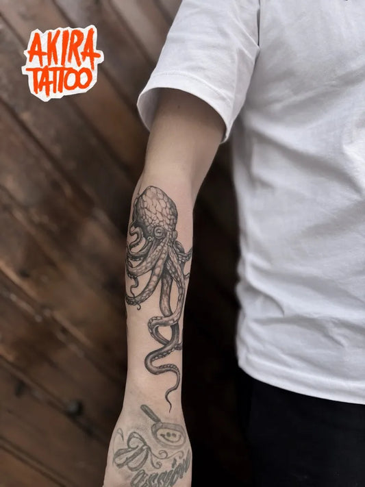 Big Black and Grey Octopus Tattoo on Men Arm by @akira_tattoo_artstudio