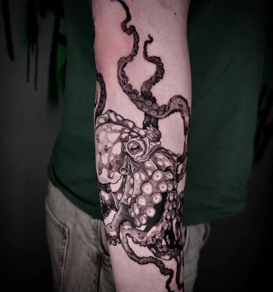 Big Black and Grey Octopus Tattoo on Men Arm by @dorota_belch_ink