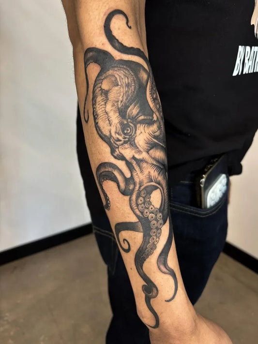 Big Black and Grey Octopus Tattoo on Men Arm by @generation8tattoo