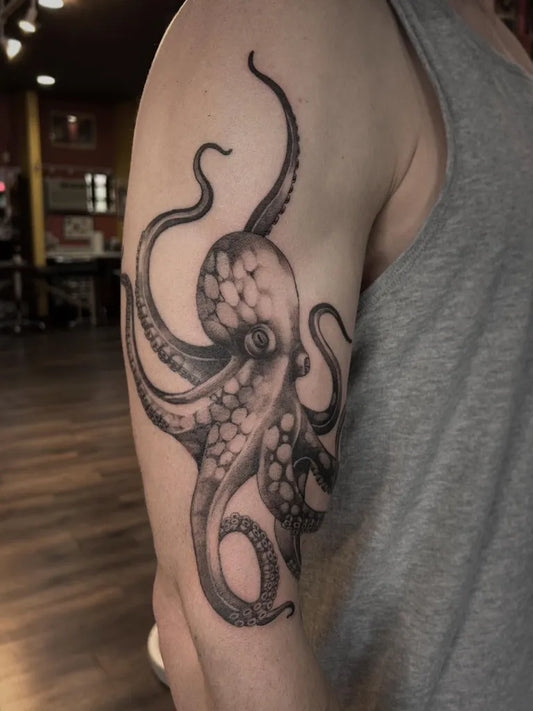 Big Black and Grey Octopus Tattoo on Men Arm by @takomanink
