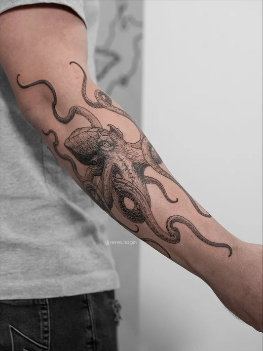 Big Black and Grey Octopus Tattoo on Men Arm by @veres.hagin