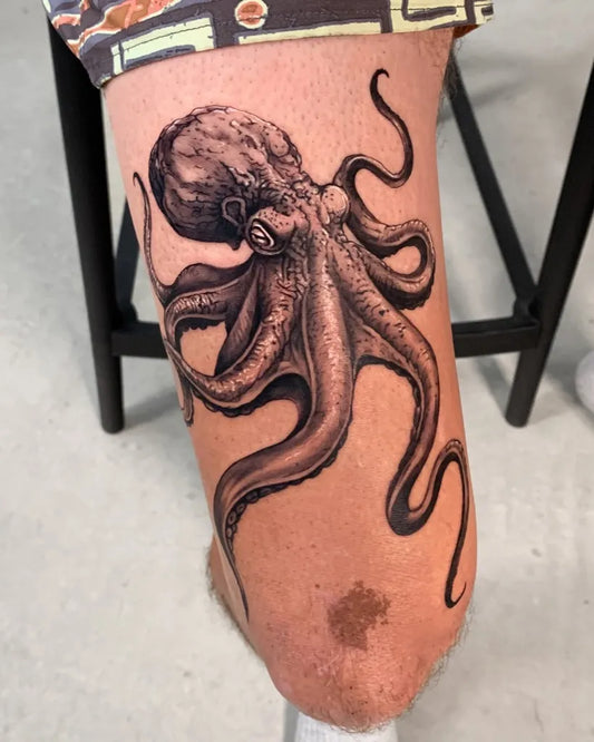 Big Black and Grey Octopus Tattoo on Men Leg by @bones.ttt