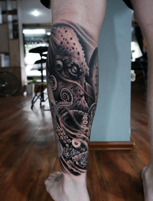 Big Black and Grey Octopus Tattoo on Men Leg by @familiatattoo_bali