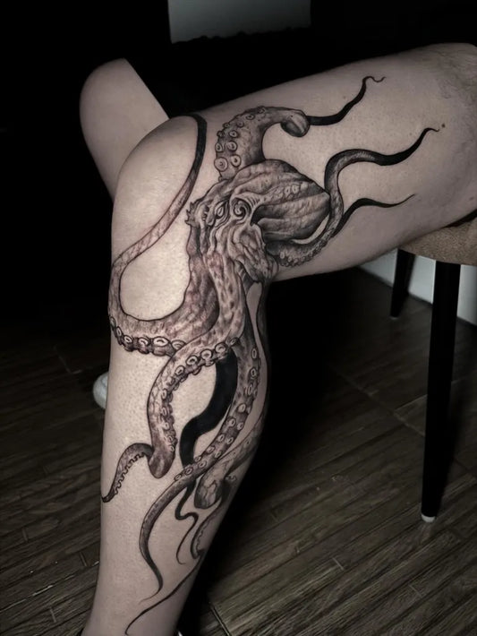 Big Black and Grey Octopus Tattoo on Men Thigh by @lurk_tattoo