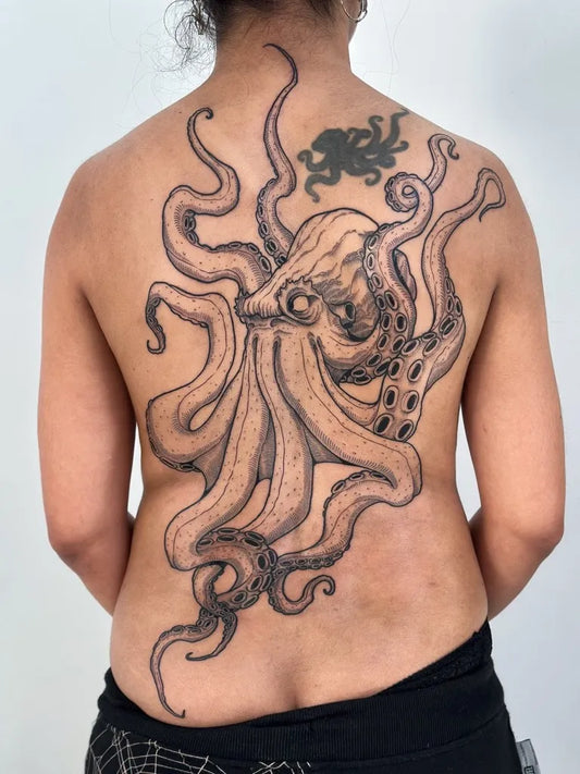 Big Black and Grey Octopus Tattoo on Women Back by @sad_cid