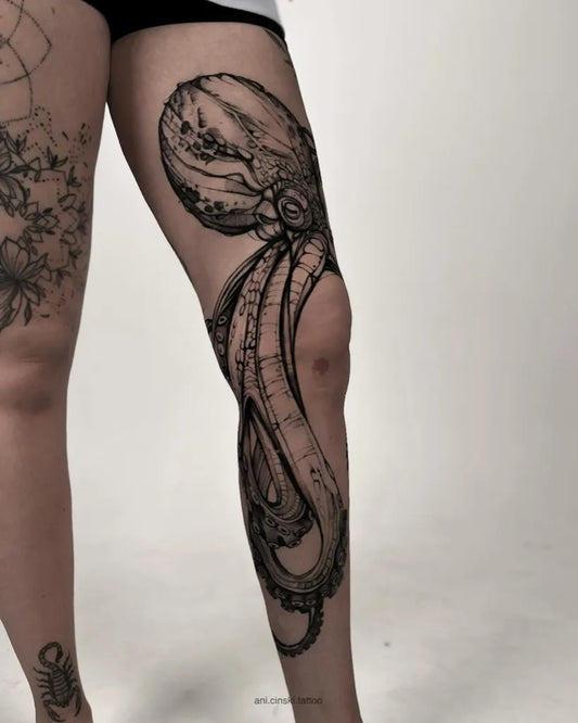 Big Black and Grey Octopus Tattoo on Women Thigh by @ani.cinski.tattoo