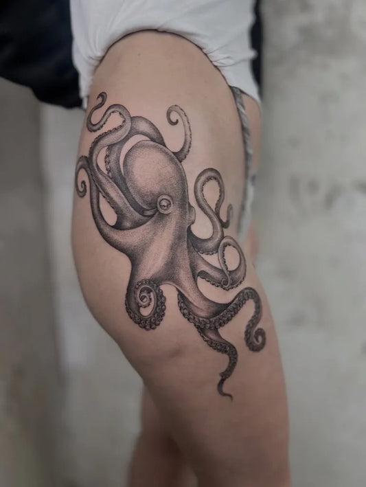 Big Black and Grey Octopus Tattoo on Women Thigh by @animauxsauvages.tattoo