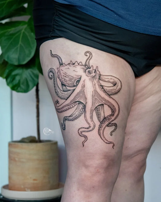 Big Black and Grey Octopus Tattoo on Women Thigh by @kraken.queen_tattoo