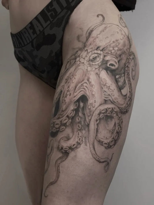 Big Black and Grey Octopus Tattoo on Women Thigh by @studio_emmanuel_mazzeo