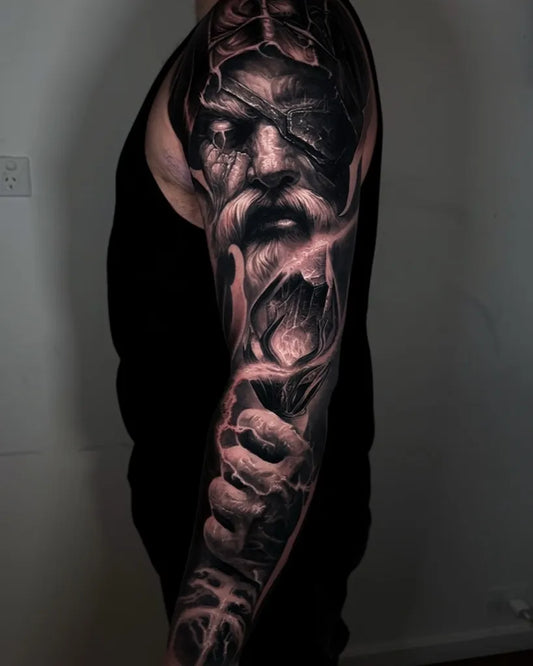 Big Black and Grey Odin Portrait Tattoo on Men Arm by @rimen_tattoo