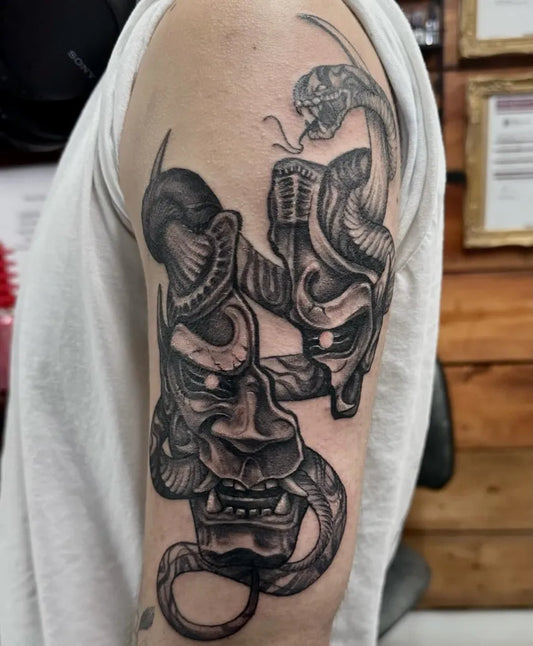 Big Black and Grey Oni Mask and Cobra on Men Arm Tattoo by @charisma.ink