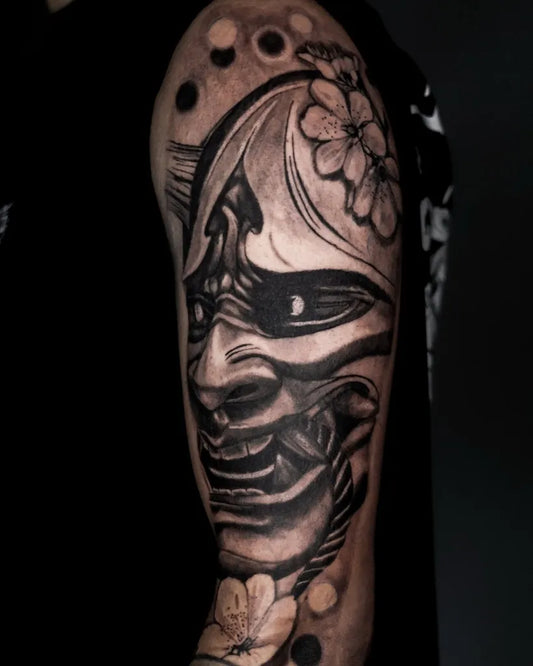 Big Black and Grey Oni Mask with Cherry Blossoms on Men Arm Tattoo by @asi_designs