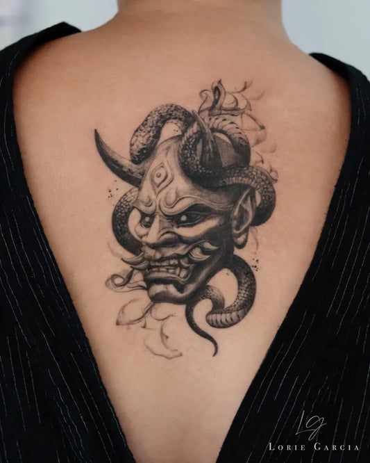 Big Black and Grey Oni Mask with Snake on Women Back Tattoo by @lorie_garcia_tattoo