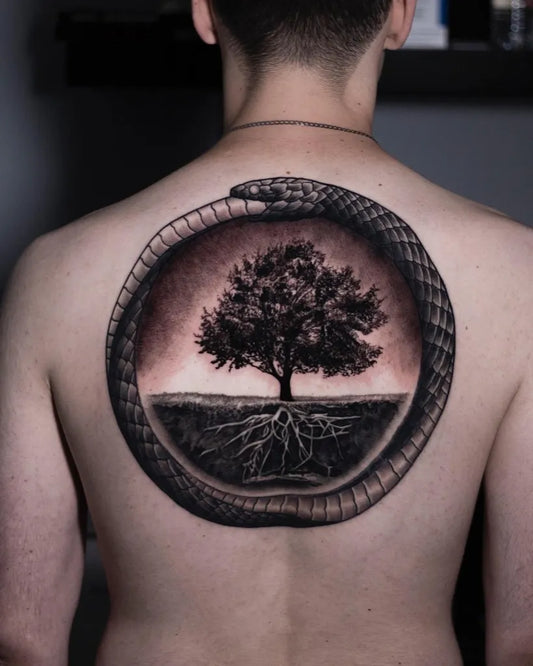 Big Black and Grey Ouroboros Tree Tattoo on Men Back by @roudolfdimovtattoos
